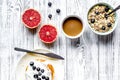 Breakfast concept with flowers on wooden background top view Royalty Free Stock Photo