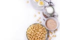 A Breakfast of corn flakes, eggs, milk and tea on a whit Royalty Free Stock Photo
