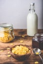 Breakfast with corn flakes, milk and jam Royalty Free Stock Photo