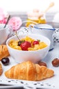 Breakfast with cornflakes berry honey and croissant Royalty Free Stock Photo