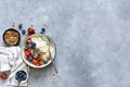 Breakfast - cottage cheese with berries and a cup of coffee, top view. Granola with nuts, honey and strawberries Royalty Free Stock Photo