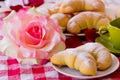 Breakfast croissant and coffee - brioches