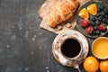 Breakfast with croissant, coffee, orange juice and berries Royalty Free Stock Photo