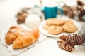 Breakfast with croissants, biscuits, cookies and coffee