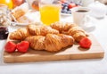 Breakfast with croissants, coffee, juice,  jam, cereals and fresh fruits Royalty Free Stock Photo