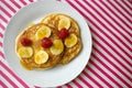 Breakfast crumpets with banana and raspberry Royalty Free Stock Photo