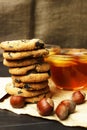 Breakfast with a cup of black hot tea and fresh baking with chocolate and hazelnuts Royalty Free Stock Photo