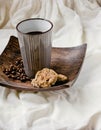 Breakfast. A cup of coffee with cookies with peanut butter, coffee beans in a wooden plate. Good morning concept.Selective focus. Royalty Free Stock Photo