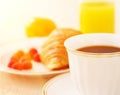 Breakfast. A cup of coffee, croissant Royalty Free Stock Photo