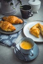 Breakfast - cup of coffee, croissants and curd cheese turnover
