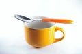 Breakfast cup with spoon.