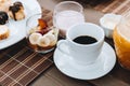 Breakfast with a delicious cup of coffee and fruits Royalty Free Stock Photo