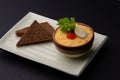Breakfast with dish from soft-boiled egg with red caviar, served with bread Royalty Free Stock Photo