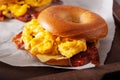 Breakfast egg and bacon sandwich on bagel with cheese Royalty Free Stock Photo