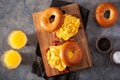 breakfast egg and bacon sandwich on bagel with cheese Royalty Free Stock Photo