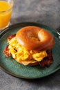 breakfast egg and bacon sandwich on bagel with cheese Royalty Free Stock Photo