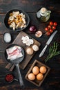 Breakfast egg ingredients, on old dark  wooden table background, top view flat lay Royalty Free Stock Photo