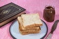 breakfast food whole wheat bread loaf slice has chocolate and book.