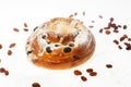 Breakfast. Fresh sweet bun with powdered sugar and raisins on white background Royalty Free Stock Photo