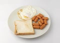 Breakfast fried egg bread on white background. Royalty Free Stock Photo