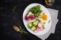 Fried egg, fresh vegetable salad and lard sandwich. Keto diet. Top view Royalty Free Stock Photo