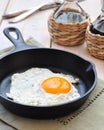 Breakfast the fried egg in a iron frying pan Royalty Free Stock Photo