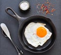 Breakfast the fried egg in a iron frying pan Royalty Free Stock Photo