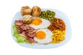 Breakfast fried egg peas, corn grains, beans and fried bacon on a white plate