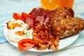 Breakfast with fried eggs, bacon and buns for Chrono diet, Chrono diet concept