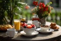 Breakfast in the garden. Milk, fruits, bread, berries on a wooden table. Royalty Free Stock Photo