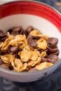 Breakfast golden and chocolate cornflakes cereal bowl Royalty Free Stock Photo