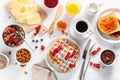 Breakfast with granola berry nuts, waffle, toast, jam, chocolat Royalty Free Stock Photo