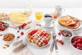 Breakfast with granola berry nuts, waffle, toast, jam, chocolat Royalty Free Stock Photo