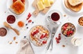 Breakfast with granola berry nuts, waffle, toast, jam, chocolate spread and coffee. Top view Royalty Free Stock Photo