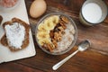 Breakfast with Granola Bowl, Muesli with Oats, Nuts and Dried Fruit, Milk, on Wooden table. Bannana, nuts, fruits. Healthy Breakfa