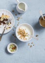 Breakfast - greek yogurt with granola and pistachios, chocolate cake and coffee. Royalty Free Stock Photo