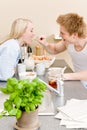 Breakfast happy couple man feed woman cereal