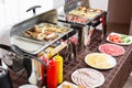 Breakfast at the hotel. Buffet Table with dishware waiting for guests Royalty Free Stock Photo