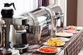 Breakfast at the hotel. Buffet Table with dishware waiting for guests Royalty Free Stock Photo