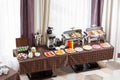 Breakfast at the hotel. Buffet Table with dishware waiting for guests Royalty Free Stock Photo