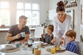 Breakfast is indeed a very important meal. a family having breakfast together. Royalty Free Stock Photo