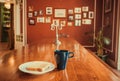 Breakfast inside dinning room of old house. Cheese sandwich and hot coffee for morning table