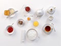 Breakfast with tea, toasts, butter, juice, jam, egg and rice porridge on white. 3D illustration