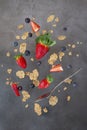 Breakfast levitation, cereal with strawberry and blueberry.