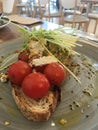 Smashed Avocado and tomatoes meal