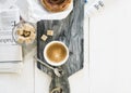 Danish coffee breadroll with coffee and newspaper