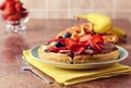 Breakfast of mixed fruit waffle with chocolate spread