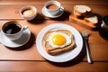 Slice of bread with honey on a white plate on wooden table