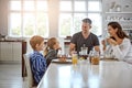 Breakfast is the most important meal of the day. a family having breakfast together.