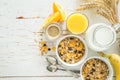 Breakfast - muesli and fruits on white background